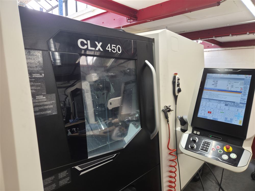 The DMG MORI CLX 450 turning centre, with its control panel beside the door.